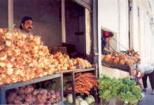 [Man Selling Produce In Cuba]